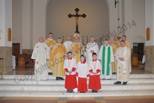 Bishop McGough with Priests and Altar Servers at the End of the Mass